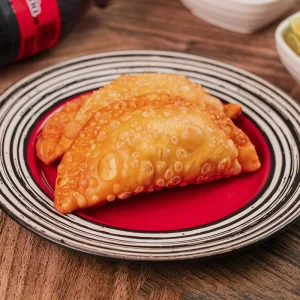 Combo Empanaditas: 2 Empanaditas de lechona + 1 Coca-Cola 500ml